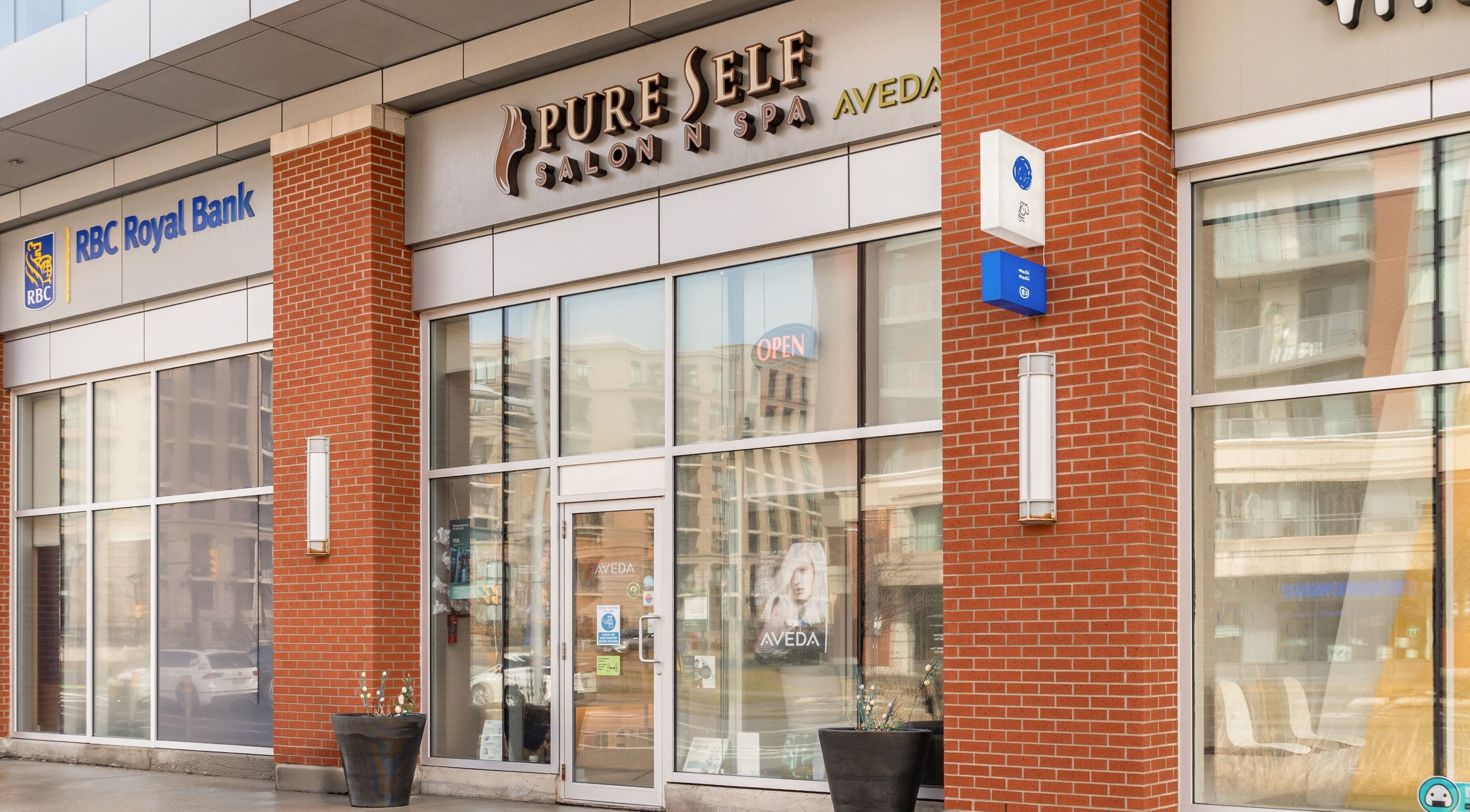 Exterior of Pure Self Salon N Spa | AVEDA Salon in Markham, Ontario, CA featuring modern design.