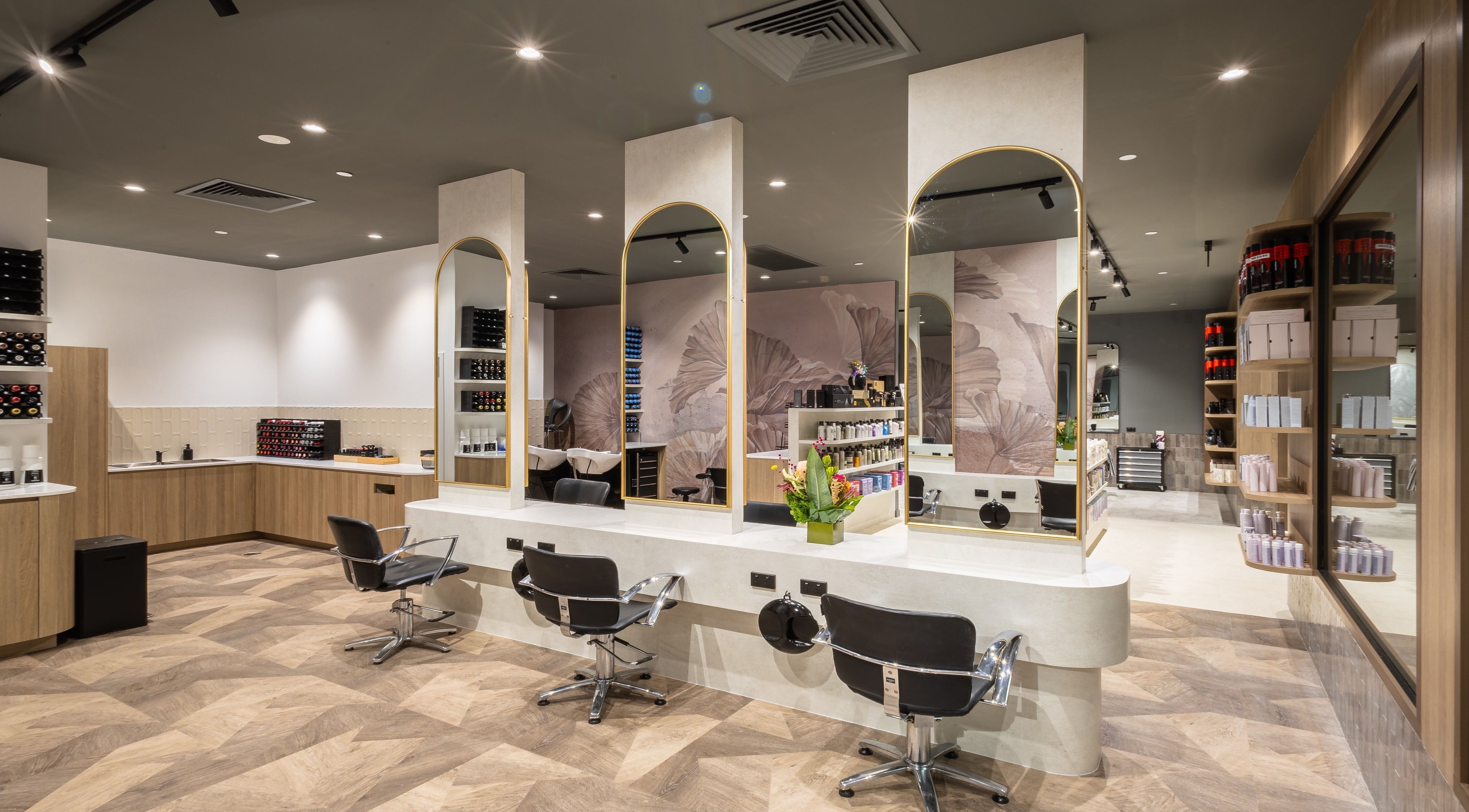 Stylish interior of Jts Rockingham salon, Rockingham, Western Australia, AU featuring modern styling stations.