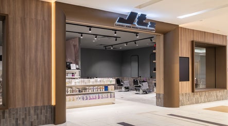Entrance view of Jts Rockingham hair salon in Rockingham, Western Australia, AU with stylish interior design.