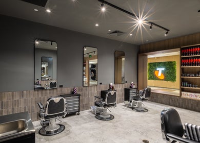 Stylish barber chairs and modern decor at Jts Rockingham, Rockingham, Western Australia, AU.