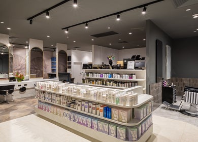 Modern salon at Jts Rockingham with styled shelves in Rockingham, Western Australia, AU.