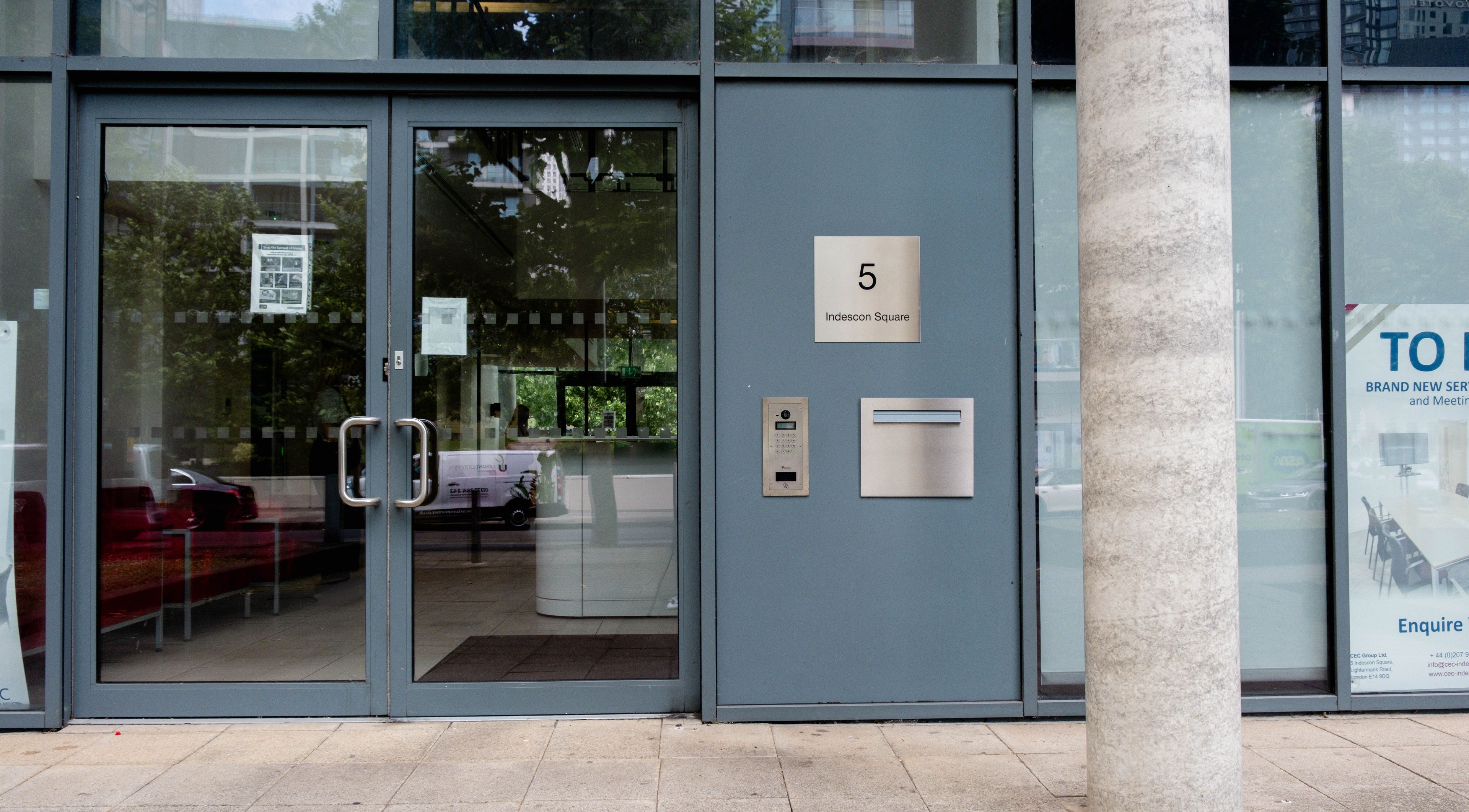 Entrance of Fazara Aesthetics at 5 Indescon Square, London E14 9DQ, England, GB showcasing sleek design.