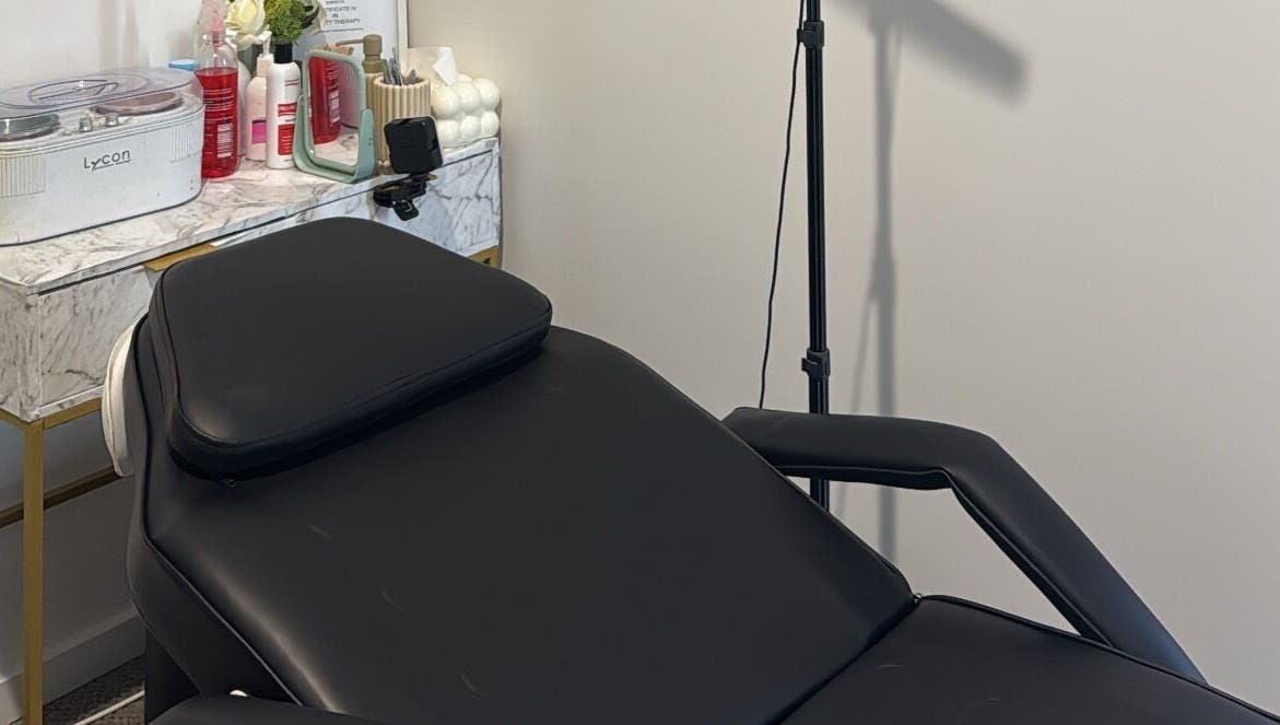 Beauty X Leena spa room in Success, Western Australia with a reclining chair and skincare products.
