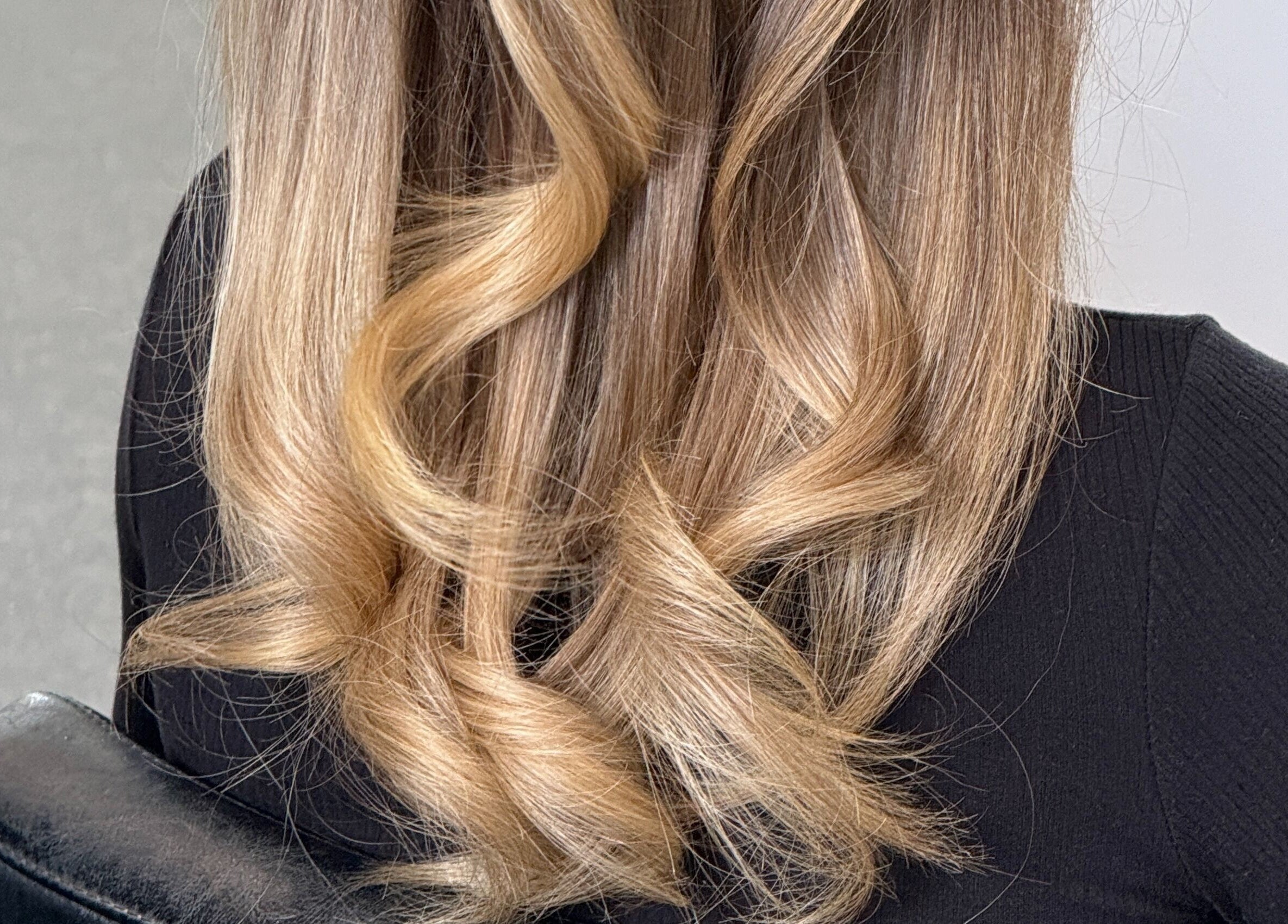 Elegant golden waves hairstyle at Blondelle Club, Albury, New South Wales, AU.