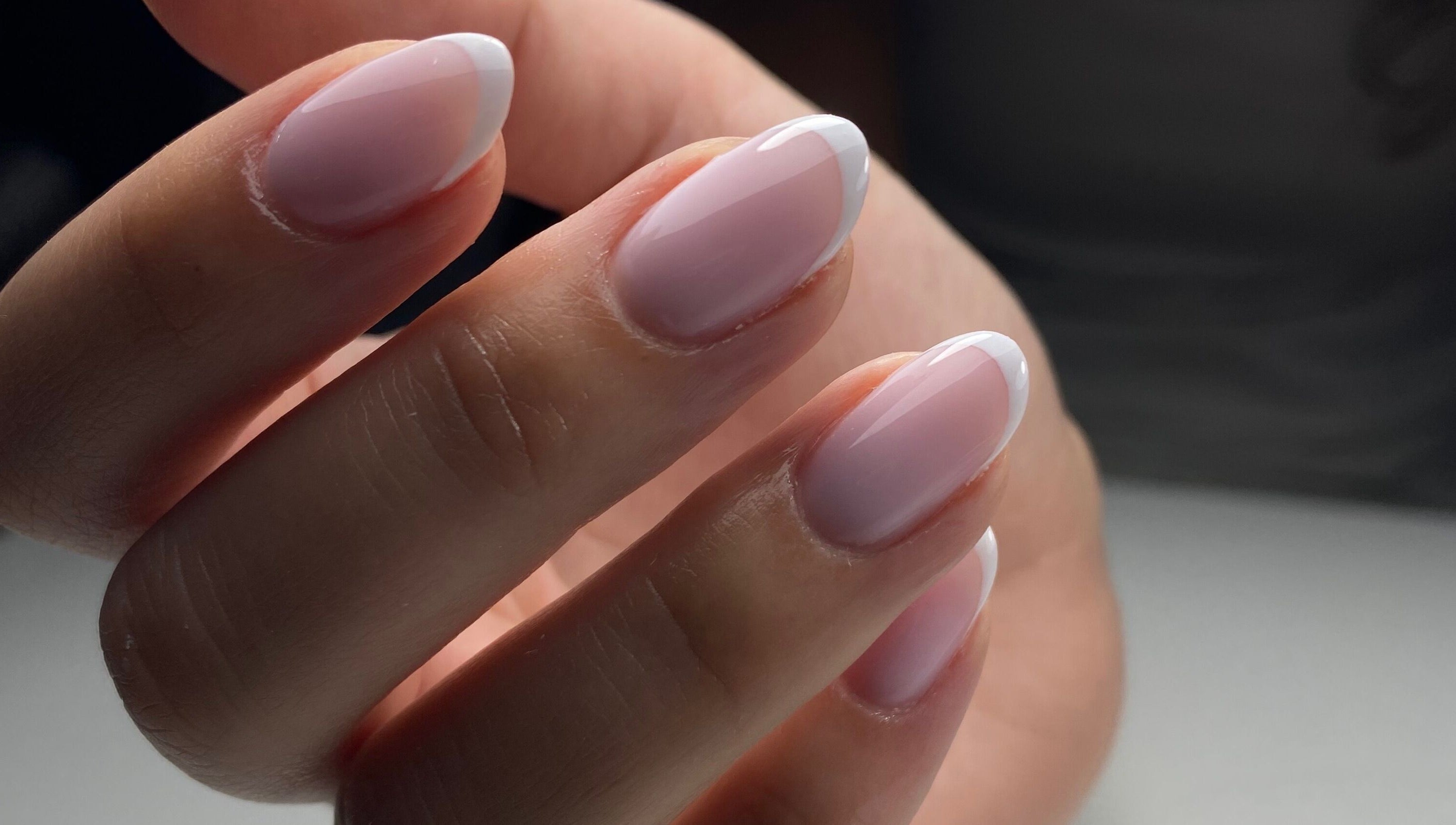 Close-up of perfectly styled French nails at The Gel Society, Southport, Queensland, AU.