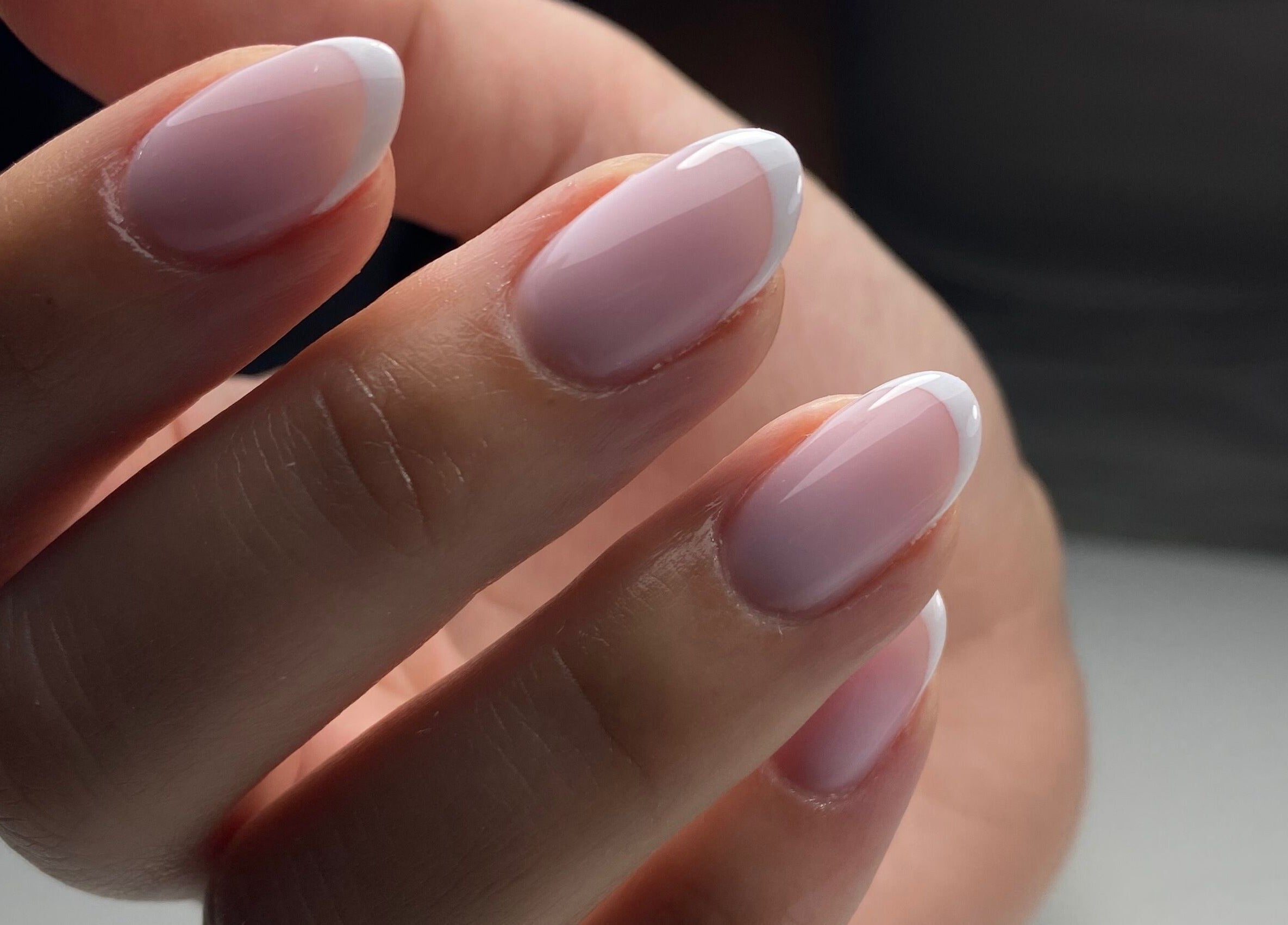 Close-up of perfectly styled French nails at The Gel Society, Southport, Queensland, AU.