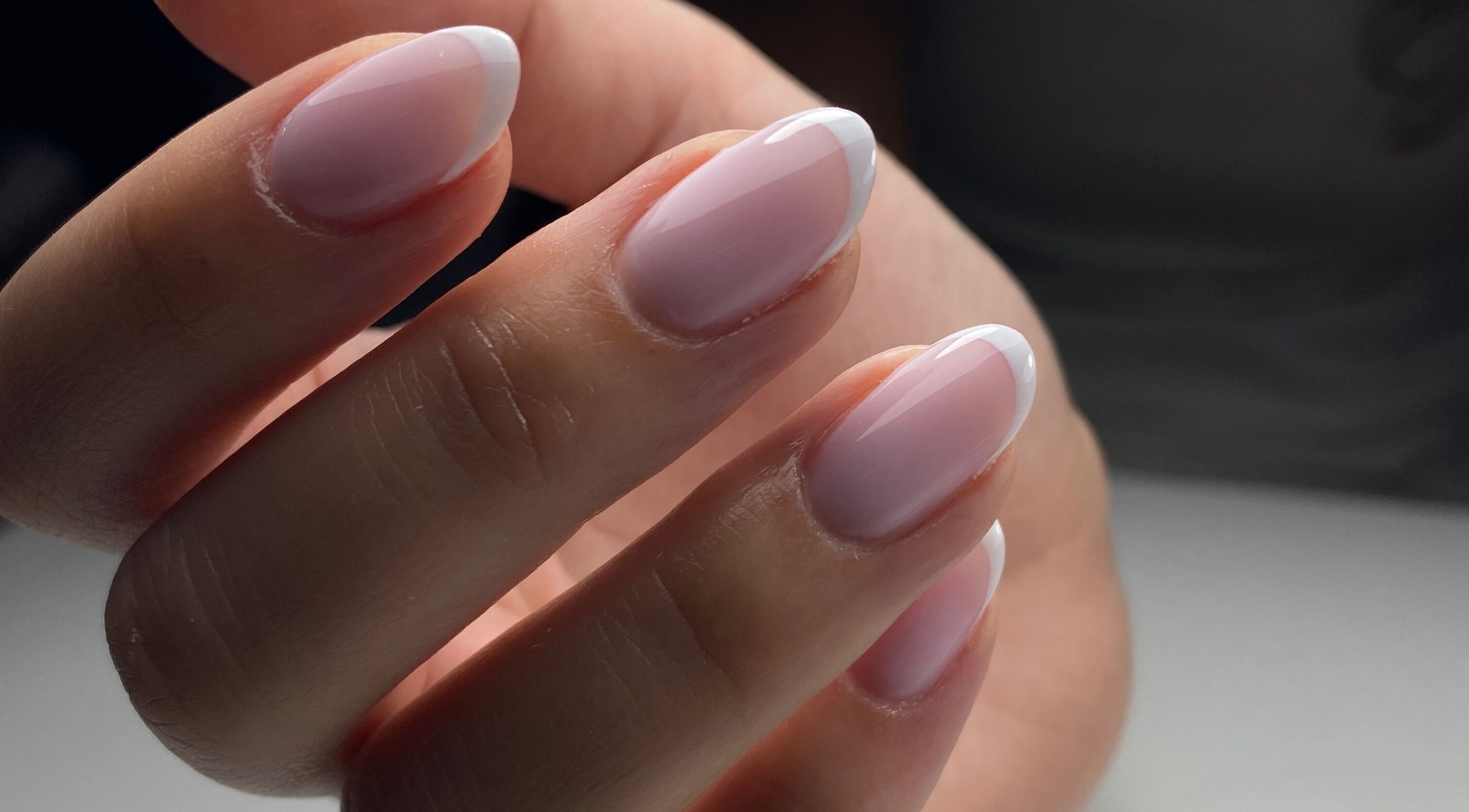 Close-up of perfectly styled French nails at The Gel Society, Southport, Queensland, AU.