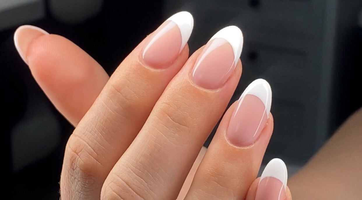 French manicure at The Gel Society, Southport, Queensland, AU showcasing elegant nail art.