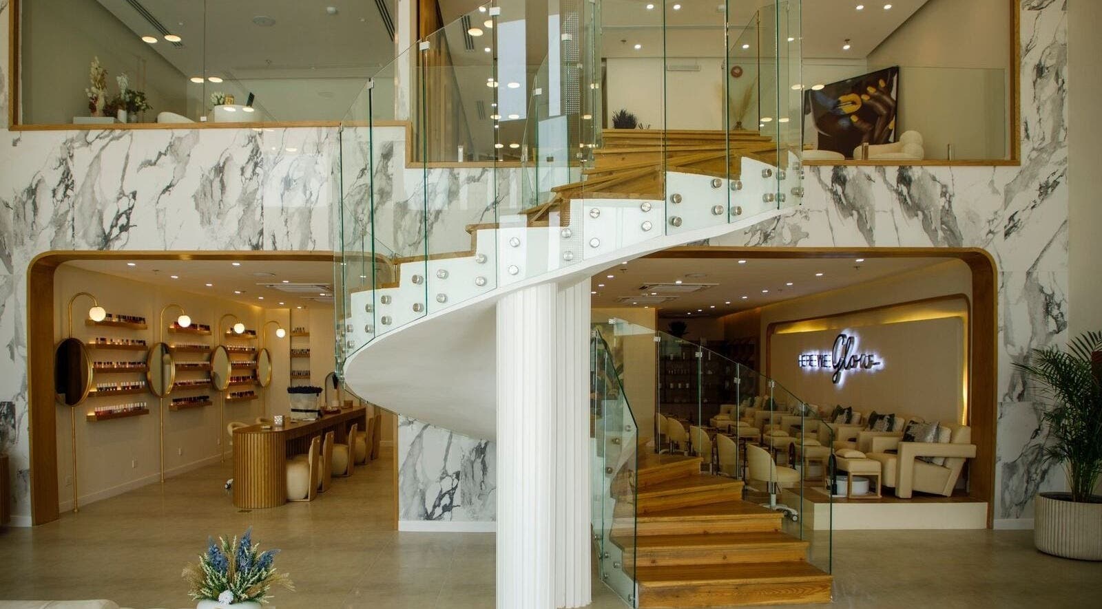 Elegant marble and glass spiral staircase at Spa Al Hana I سبا الهنا, Riyadh, Riyadh Province, SA.