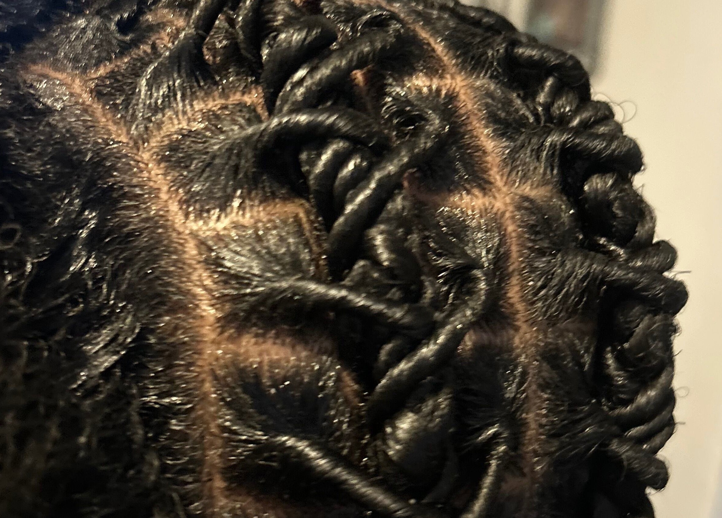 Detailed braided hairstyle at Styled by Kash, Leeds, England, GB showcasing expert hair artistry.