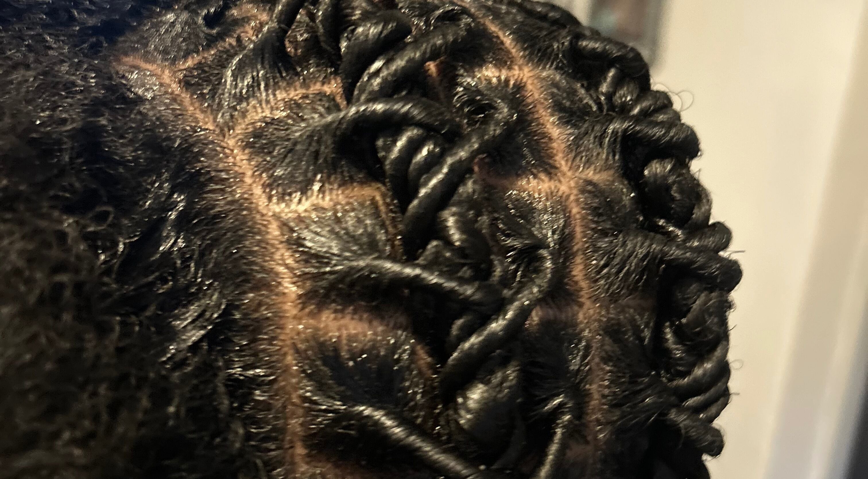 Detailed braided hairstyle at Styled by Kash, Leeds, England, GB showcasing expert hair artistry.