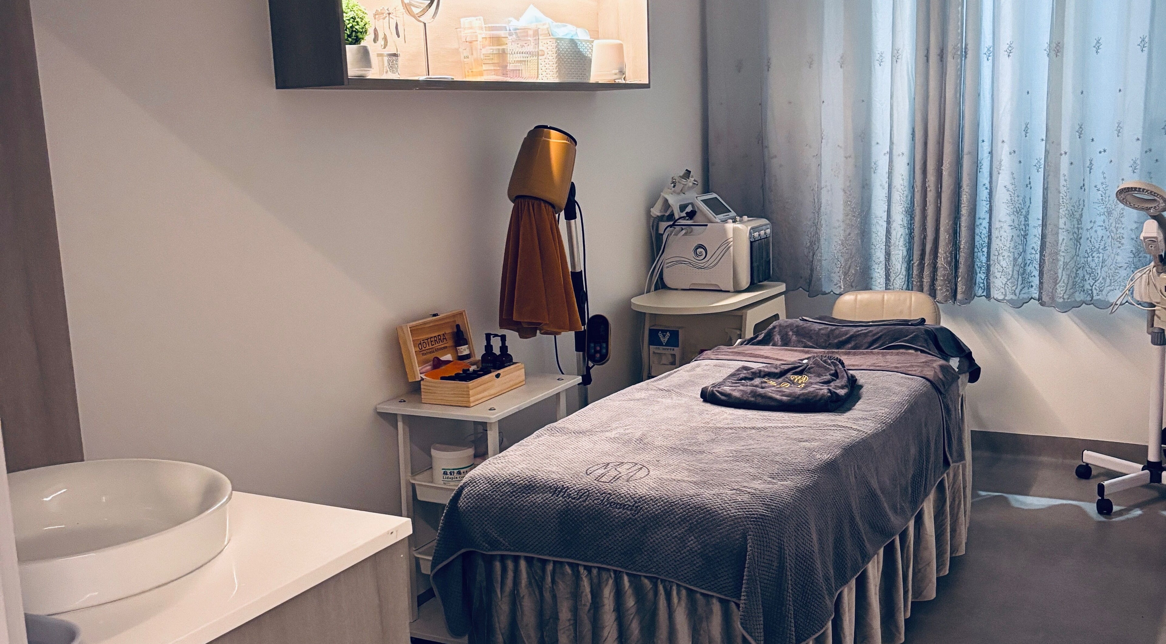 Ms.A Beauty serene spa room in Meadowbank, New South Wales, AU featuring a cozy treatment bed and soothing decor.