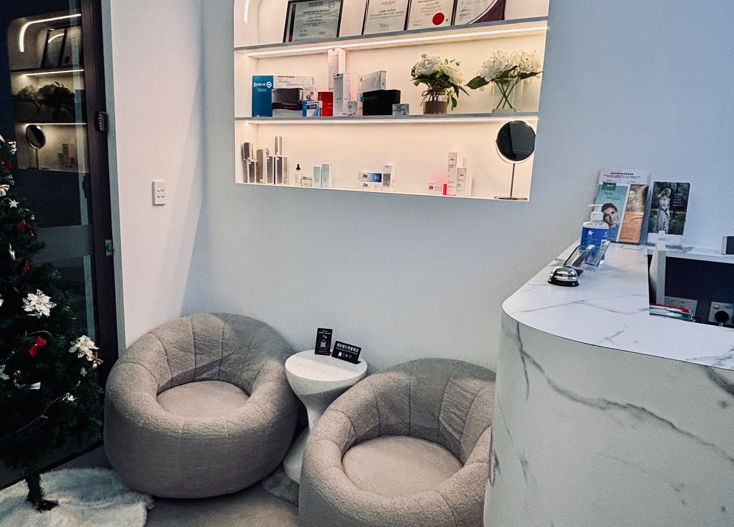 Cozy reception area at Ms.A Beauty, Meadowbank, New South Wales, AU, with plush seating and elegant decor.