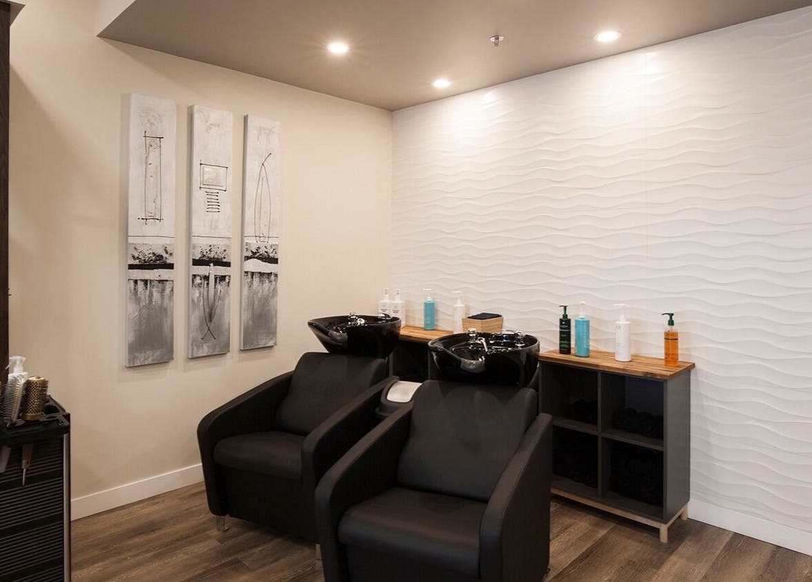 Elegant wash stations at London Hair Salon Macleod Trail in Calgary, Alberta, CA with modern decor.