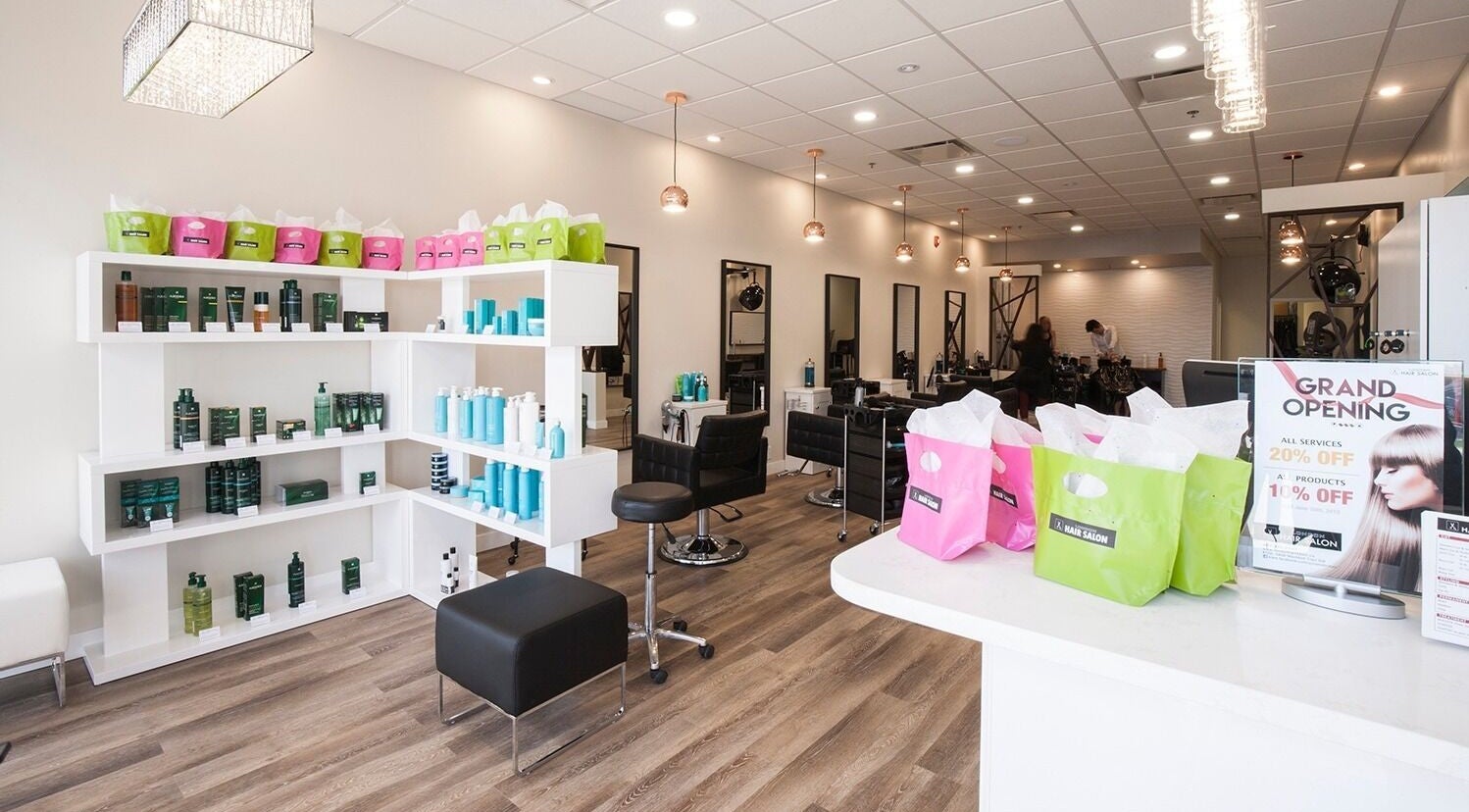 Inside view of London Hair Salon Macleod Trail, Calgary, Alberta, CA showcasing sleek décor and product shelves.