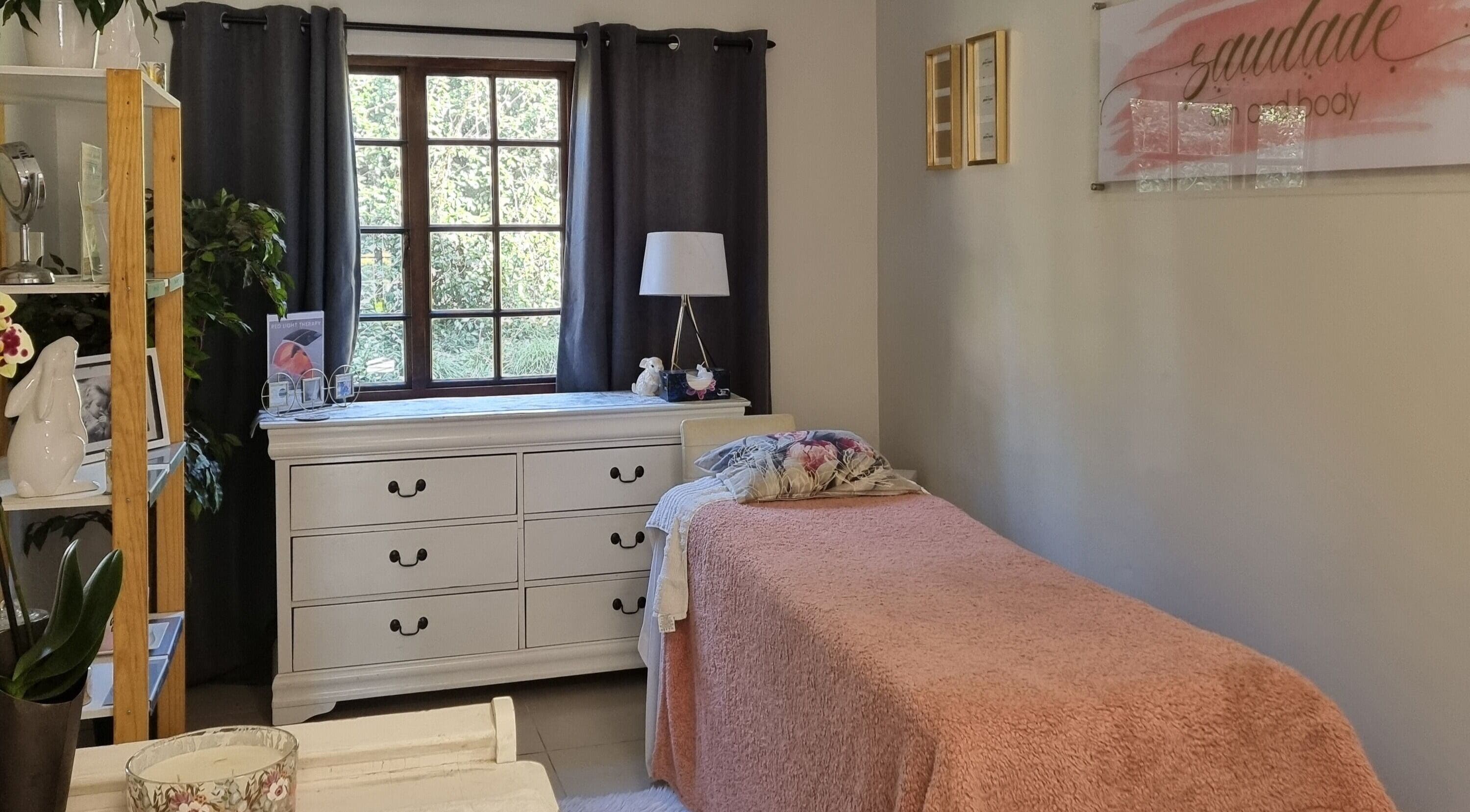 Cozy spa room at BeholdHer, Gillitts, Kwazulu-natal, ZA with a plush pink bedspread and calming decor.