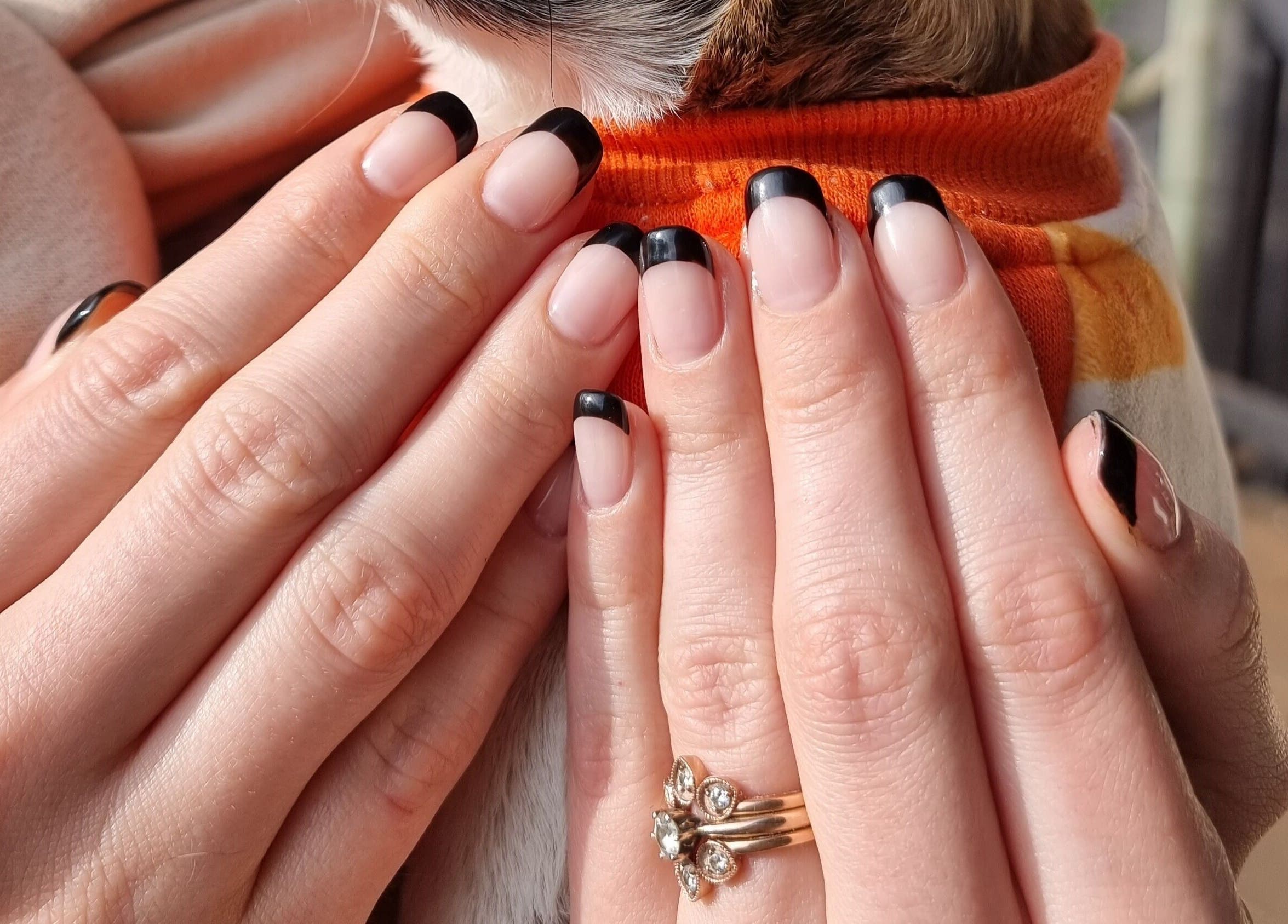 Elegant black French manicure at BeholdHer, Gillitts, Kwazulu-natal, ZA, showcasing exquisite nail artistry.