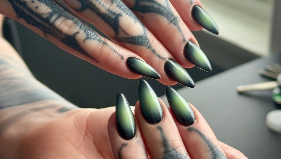 Stunning green-gradient nails with artistic tattoos at Khoi Pond Nails, Topsfield, Massachusetts, US.