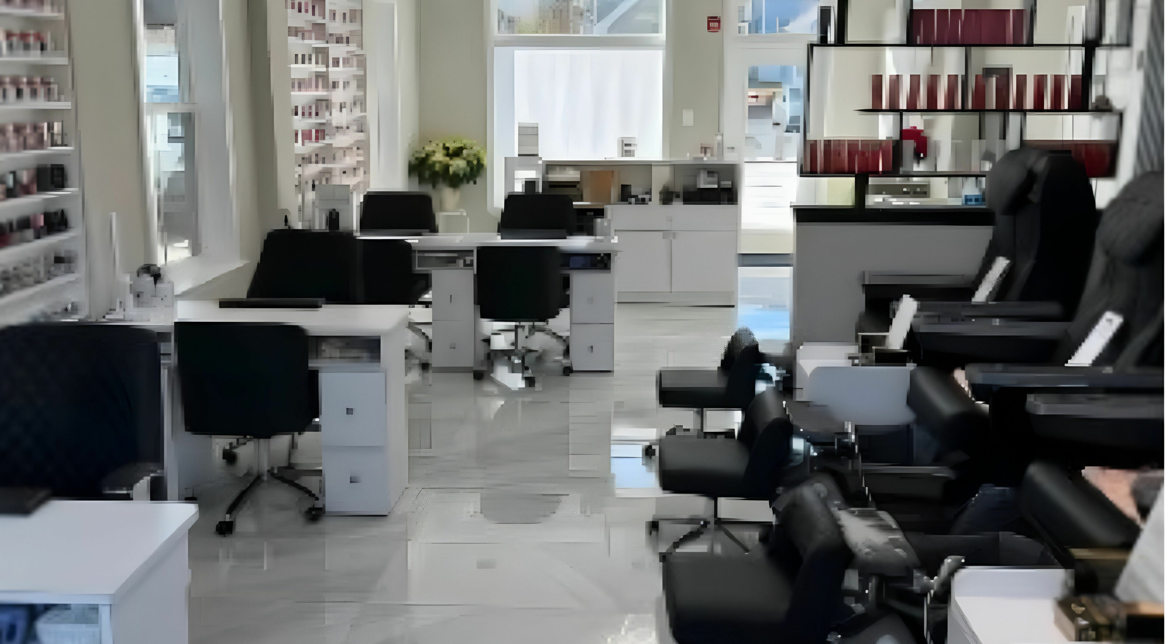 Interior of Queenie Nails & Spa in Frederick, Maryland, US, featuring modern manicure stations and plush pedicure chairs.