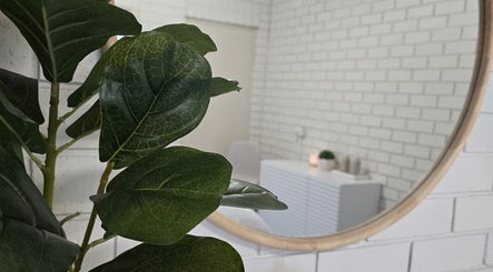 Elegant plant and mirror in Skin and Beauty by Leah, Nambucca Heads, New South Wales, AU.