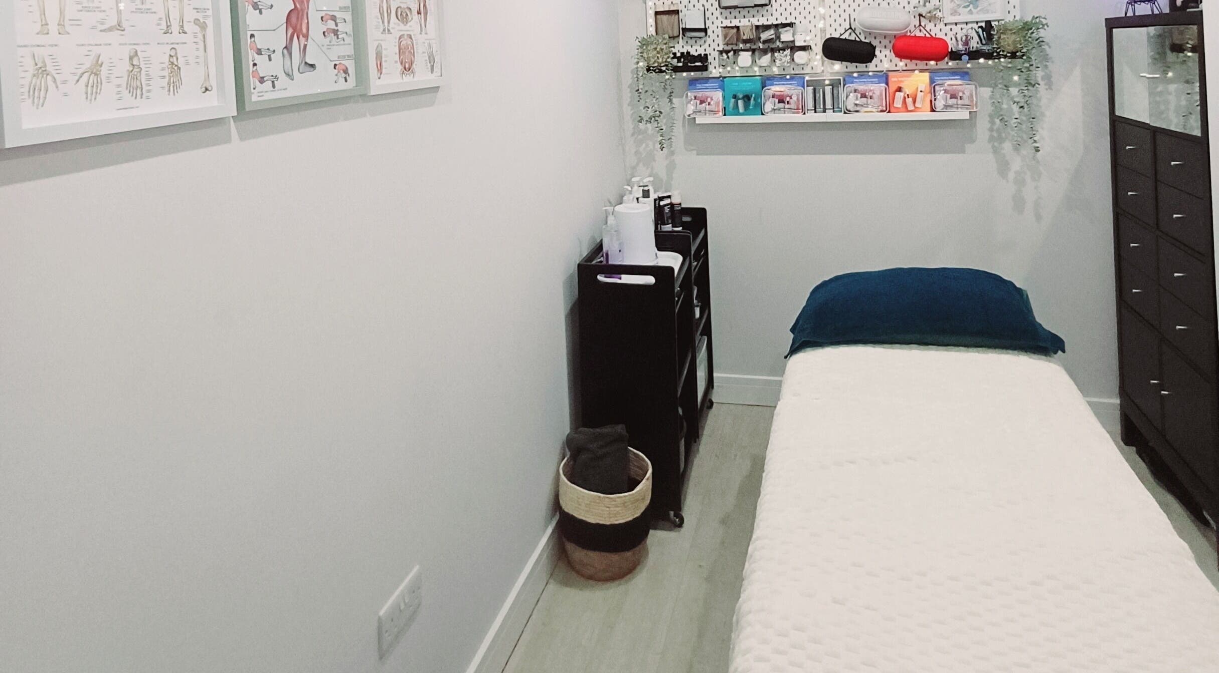 Tranquil massage room at FP Massage Therapist, Chesterfield, England, GB, featuring a cozy treatment bed.