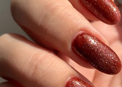 Glittery red manicure at Nails by the Sea, Hartlepool, England, GB. Perfect for any occasion.