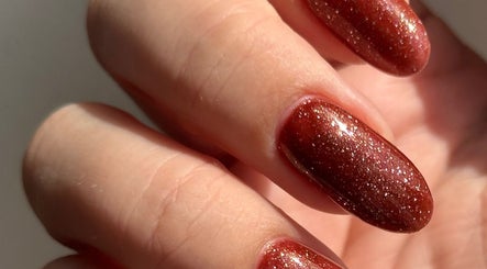 Glittery red manicure at Nails by the Sea, Hartlepool, England, GB. Perfect for any occasion.