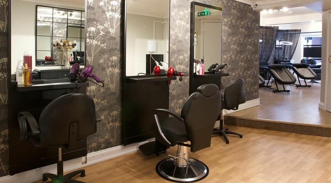 Modern salon chairs and workstations at Flirt Lash & Brow Bar, Leamington Spa, England, GB.