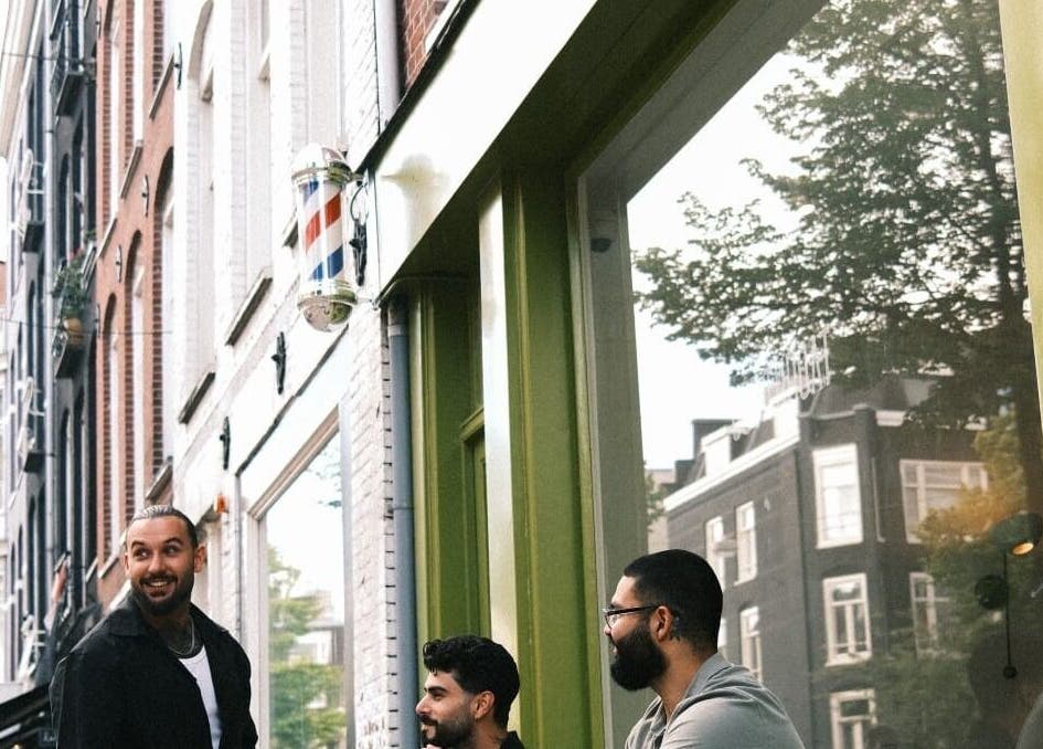 Patrons enjoying the exterior of Cut Throat - West, Amsterdam, Noord-Holland, NL.