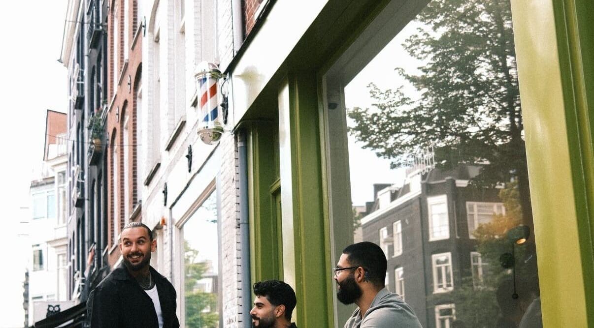 Patrons enjoying the exterior of Cut Throat - West, Amsterdam, Noord-Holland, NL.