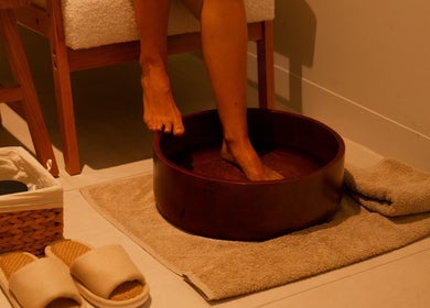 Relaxing foot bath at Mor Tide Day Spa in Fortitude Valley, Queensland, AU, offering a tranquil wellness experience.