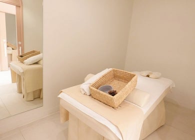 Relaxing treatment room at Mor Tide Day Spa in Fortitude Valley, Queensland, AU with massage table and calming decor.