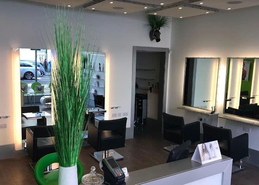 Modern salon interior at Kerry Carroll Hair Design (At JFK), Edinburgh, Scotland, GB, featuring stylish workstations.