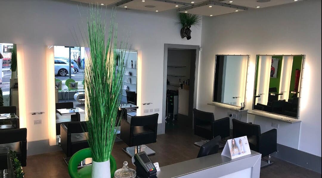 Modern salon interior at Kerry Carroll Hair Design (At JFK), Edinburgh, Scotland, GB, featuring stylish workstations.