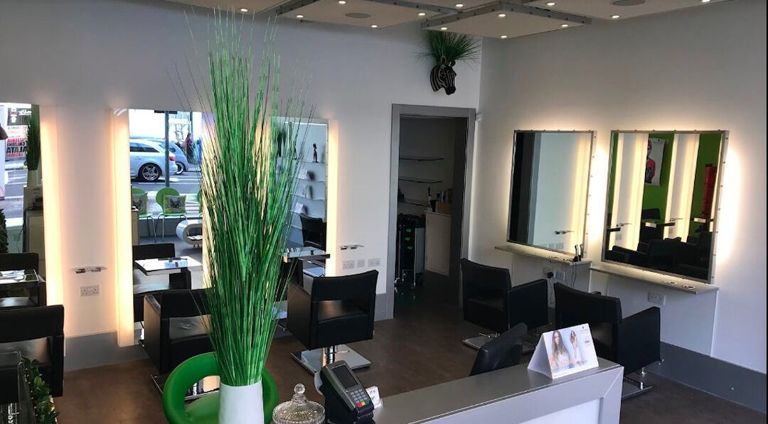 Modern salon interior at Kerry Carroll Hair Design (At JFK), Edinburgh, Scotland, GB, featuring stylish workstations.