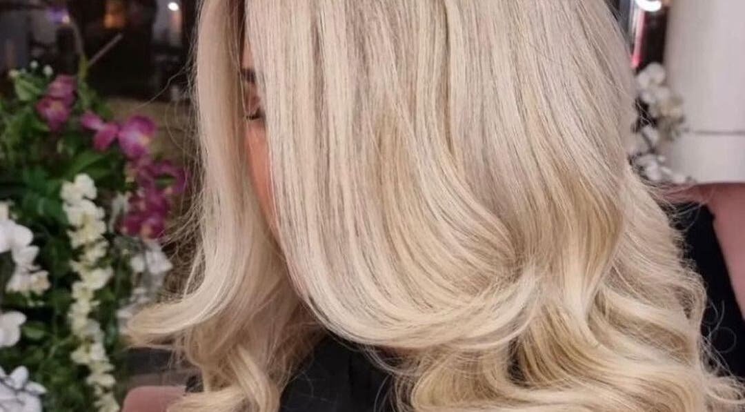 Beautiful blonde curls at Kerry Carroll Hair Design, Edinburgh, Scotland, GB.