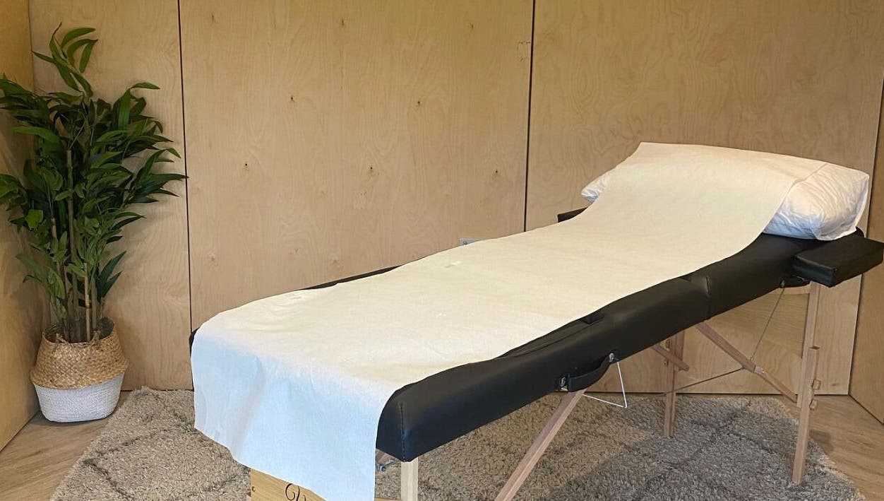 Massage bed at The Scar Spa & The Breast Physio, Wilmslow, England, GB, offering peaceful ambiance.