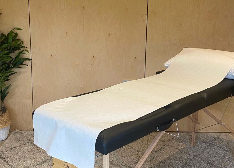 Massage bed at The Scar Spa & The Breast Physio, Wilmslow, England, GB, offering peaceful ambiance.