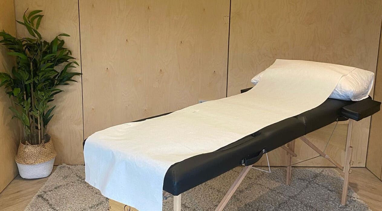Massage bed at The Scar Spa & The Breast Physio, Wilmslow, England, GB, offering peaceful ambiance.