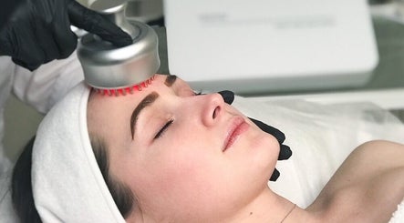 Facial treatment at Amber Beauty Therapy in Edinburgh, Scotland. Woman receiving relaxing skincare service.