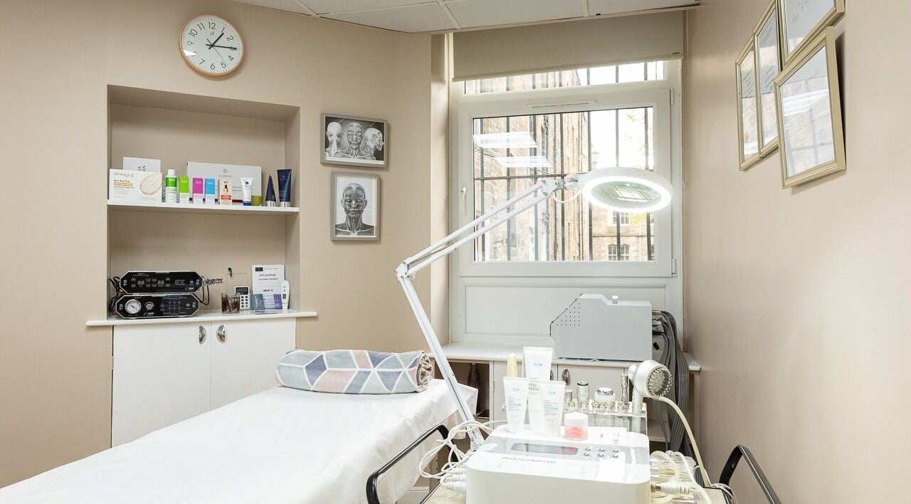 Amber Beauty Therapy treatment room with modern equipment in Edinburgh, Scotland, GB. Cozy and inviting space.