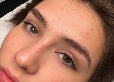 Close-up of perfectly shaped brows at Lash & Browbar Gc, Hope Island, Queensland, AU, showcasing natural beauty.
