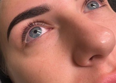 Close-up of well-groomed brows and lashes at Lash & Browbar Gc, Hope Island, Queensland, AU.