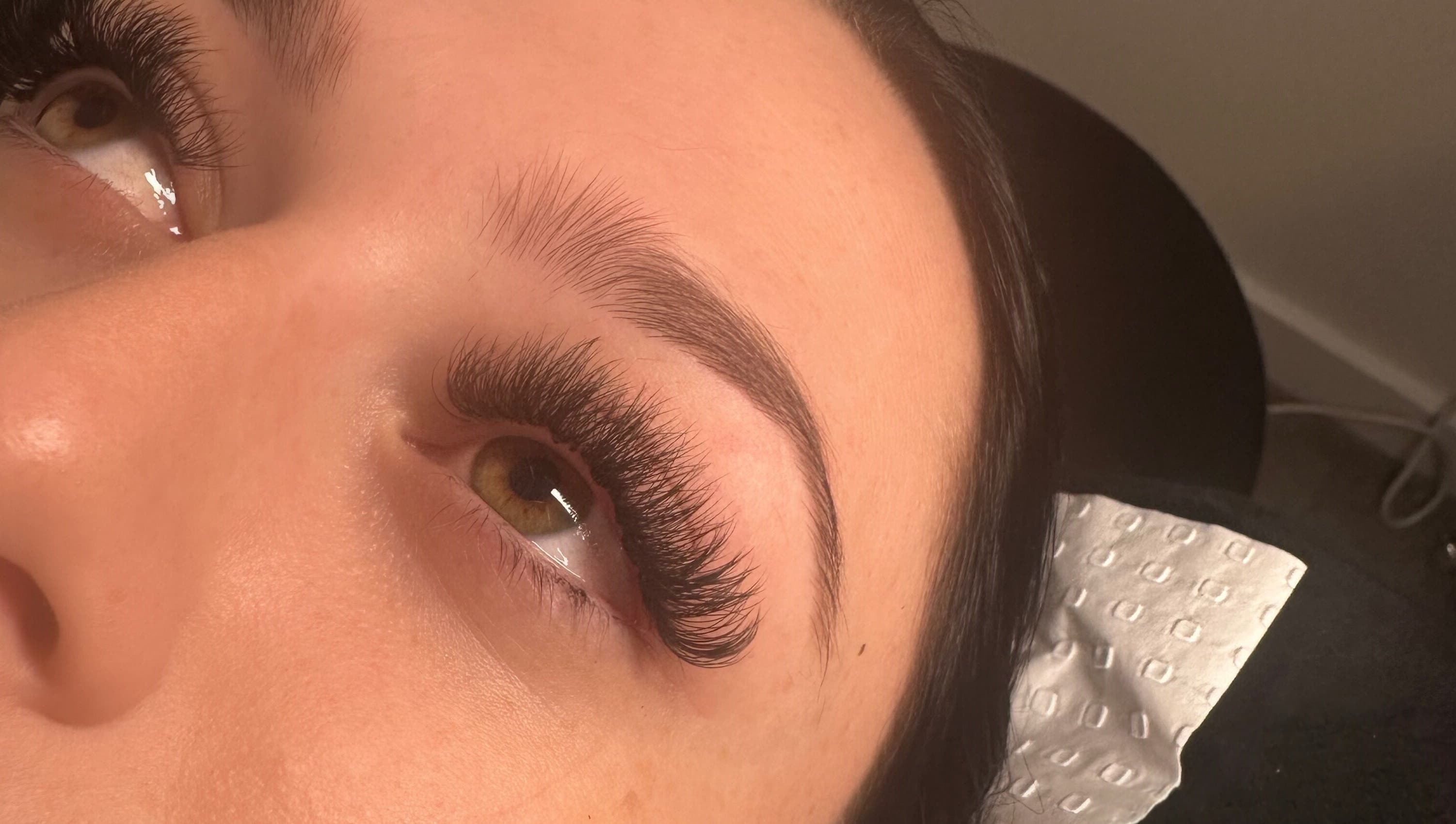 Close-up of elegant eyelash extensions at Lash & Browbar Gc, Hope Island, Queensland, AU.