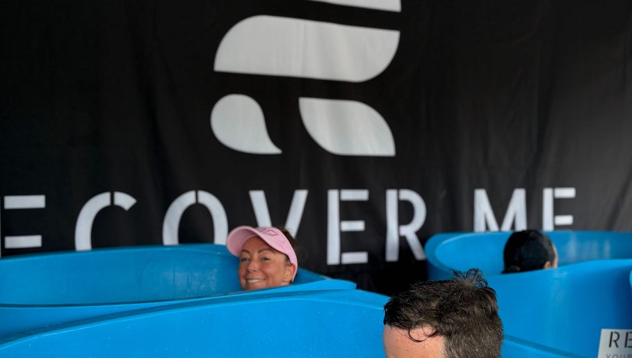 Patrons enjoying ice baths at Turf Games - Auckland, in blue tubs with a recovery sign, Auckland, Auckland, NZ.