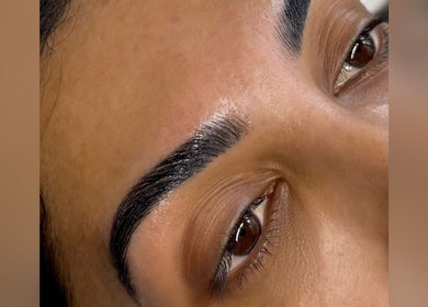 Close-up of expertly shaped eyebrows at The Brow & Nail Lounge in Worthing, England, GB.