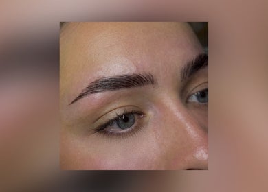 Expert brow shaping at The Brow & Nail Lounge, Worthing, England, GB, showcasing precise and defined eyebrows.