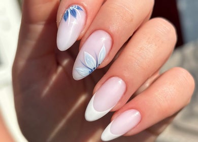 Elegant nail art with floral design at The Brow & Nail Lounge, Worthing, England, GB.