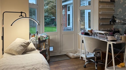 Relaxing treatment room at The Brow & Nail Lounge, Worthing, England, GB with peaceful decor and natural light.