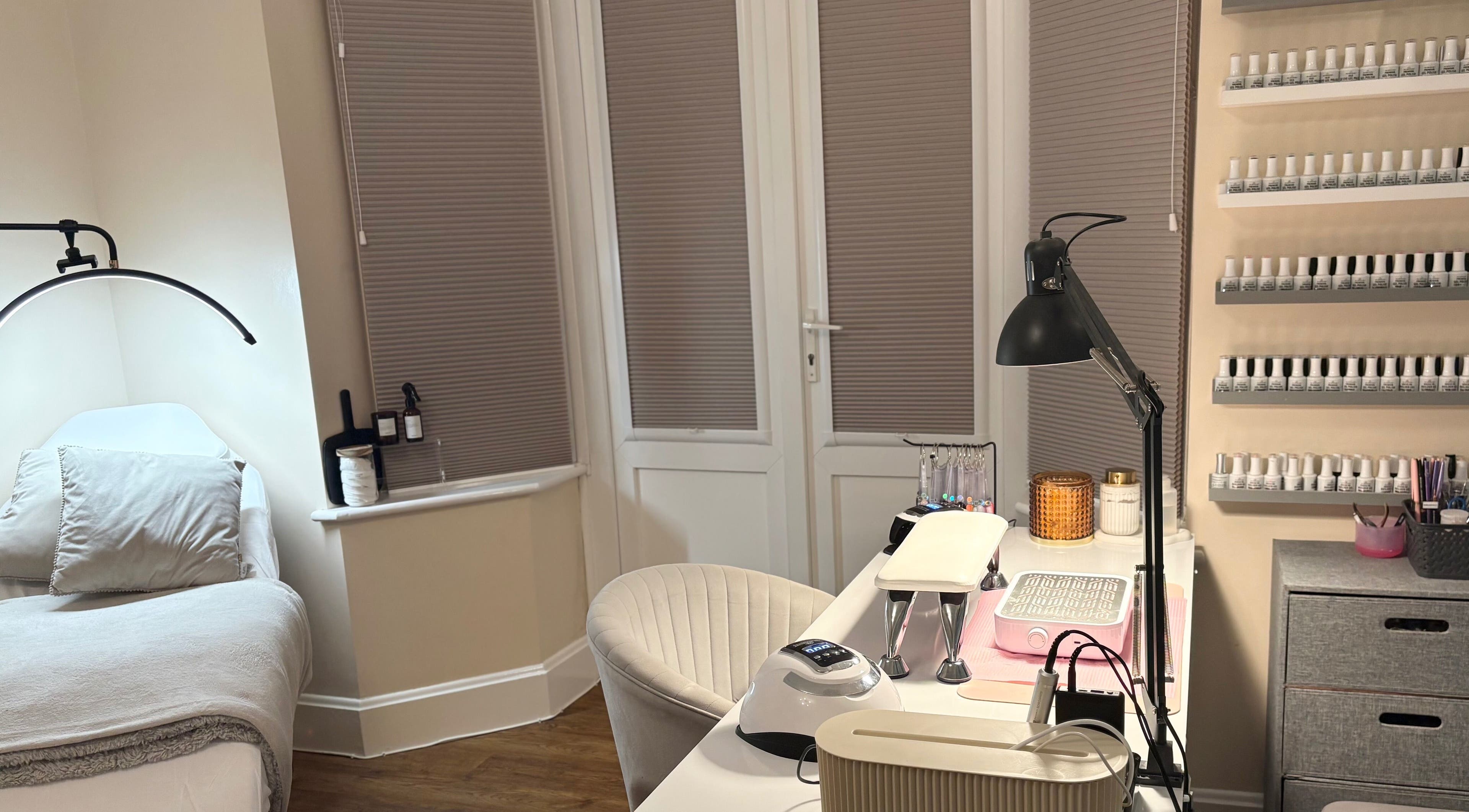Bright, serene beauty setup at The Brow & Nail Lounge, Worthing, England, GB with nail polish display.